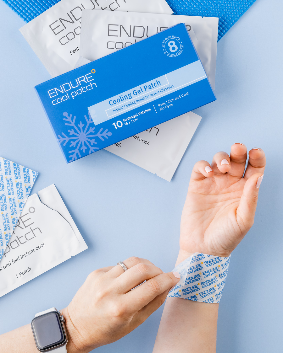 Woman using Endure Cool Patch for hot flash relief